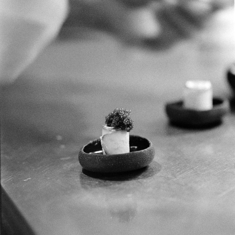 Caviar bite prepared for a refined dining experience